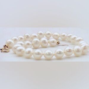 14k yellow gold and pearl bracelet
